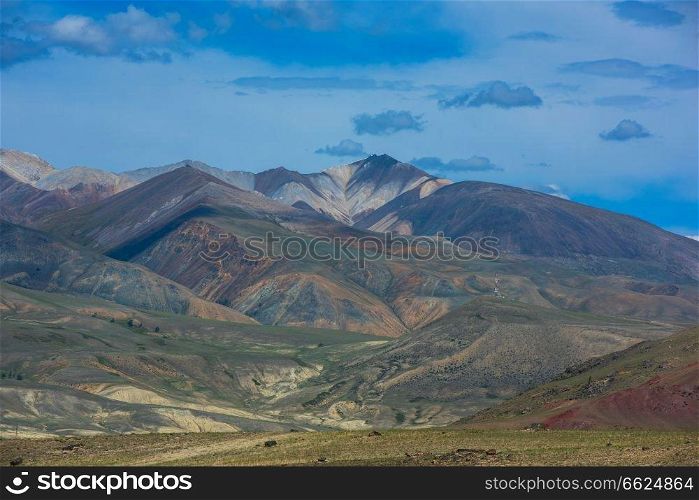 Different colored mountains in near Mongolian Altai mountains, Russia.. Different colored mountains