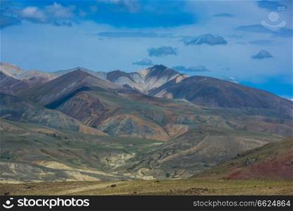 Different colored mountains in near Mongolian Altai mountains, Russia.. Different colored mountains