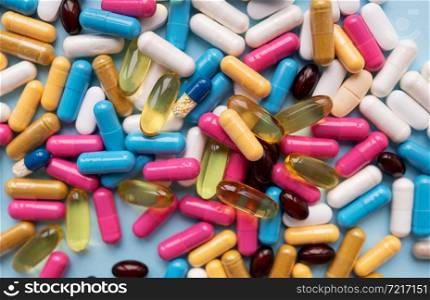 Different colorful pills for different symptoms. Health concept. Close-up. Different colorful pills for different symptoms. Health concept. Close-up.