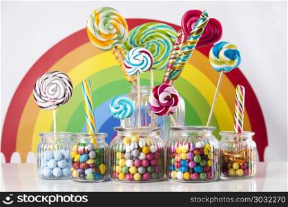 Different colorful sweets and lollipops. Lollipops and sweet candies of various colors