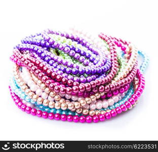 Different colors of beads necklace isolated on white. Necklace palette isolated