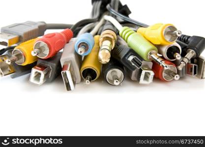 different cords and cables over a white background