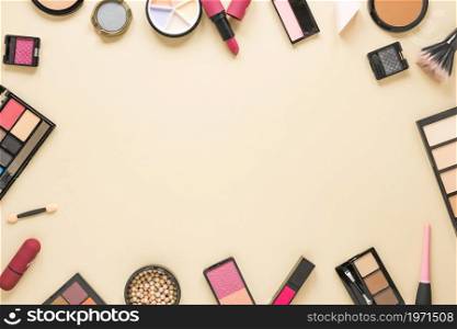 different cosmetics types scattered beige table. High resolution photo. different cosmetics types scattered beige table. High quality photo
