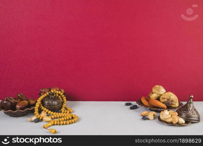 different dried fruits with nuts beads. Resolution and high quality beautiful photo. different dried fruits with nuts beads. High quality beautiful photo concept