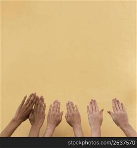 different ethnicities girls hands with copy space