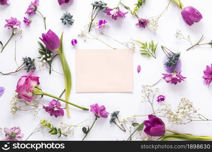 different flowers with paper white table. Resolution and high quality beautiful photo. different flowers with paper white table. High quality beautiful photo concept
