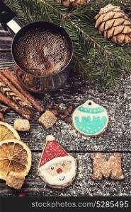 Different ginger cookies and coffee for new years and christmas on wooden background, xmas theme. Top view.. Different ginger cookies