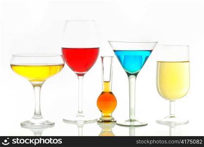 Different glasses with alcoholic drinks