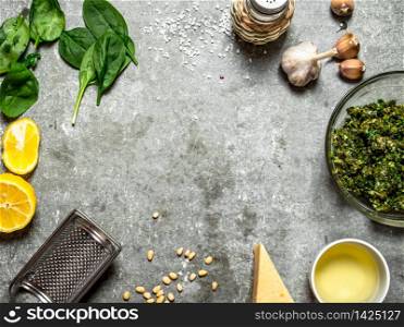 Different ingredients for Italian pesto. On the stone table.. Different ingredients for Italian pesto.