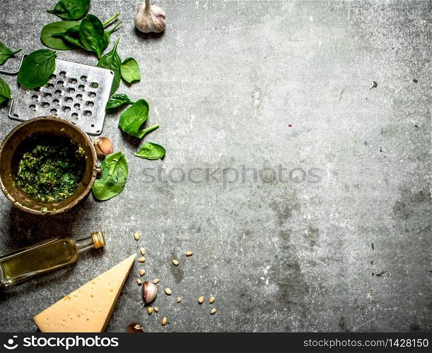 Different ingredients for Italian pesto. On the stone table.. Different ingredients for Italian pesto.