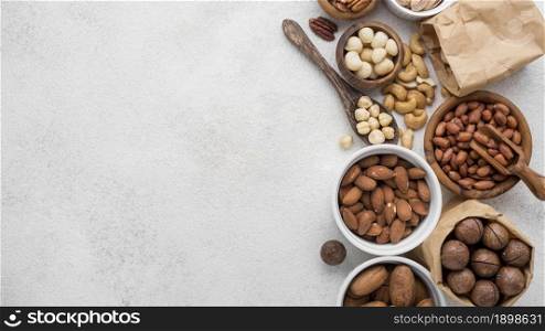 different kinds nuts bowls copy space. Resolution and high quality beautiful photo. different kinds nuts bowls copy space. High quality beautiful photo concept