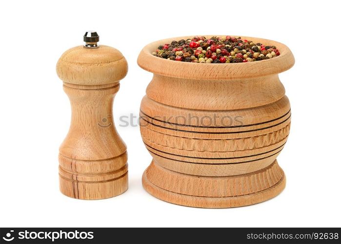 Different kinds of pepper and peppermill isolated on white background.