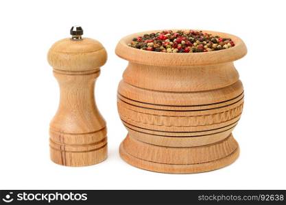 Different kinds of pepper and peppermill isolated on white background.