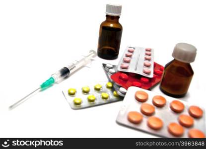 Different medicines on white background