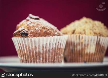 different muffins with apples. different muffins with fresh apples on white