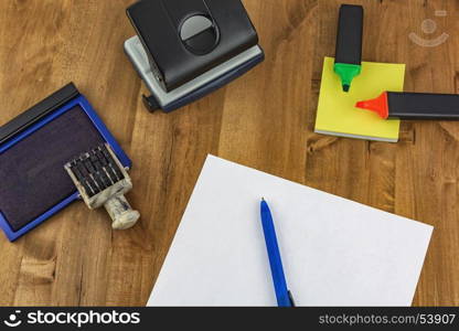 Different office supplies are on the table
