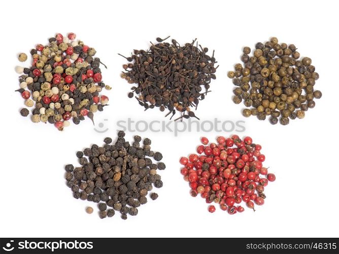 different peppers in front of white background