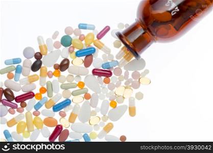 Different pills and shtanglass on white background. Different pills and shtanglass