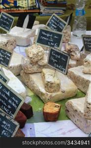 Different sorts of cheese on a local French market