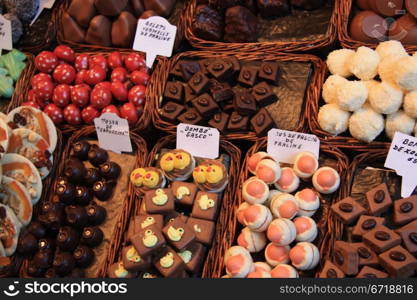 Different sorts of chocolate and pralines at a market in Barcelona, Spain