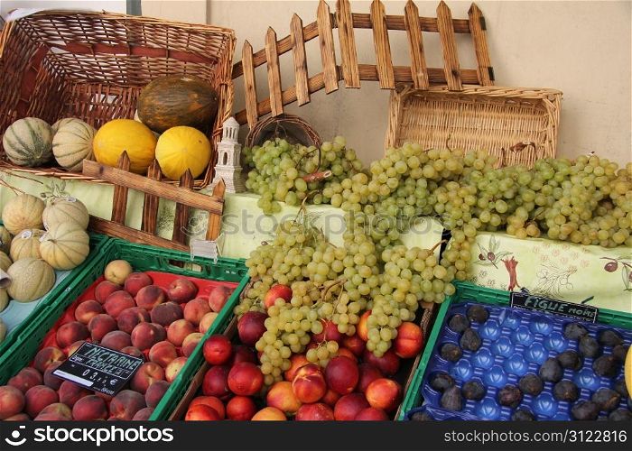 Different sorts of fruit at a local market in France