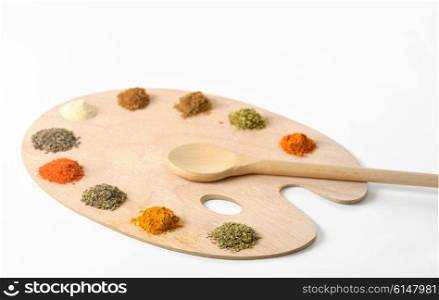 different spices and herbs isolated on white