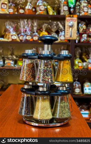 Different spices on the counter of market