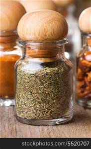 different spices on wooden table