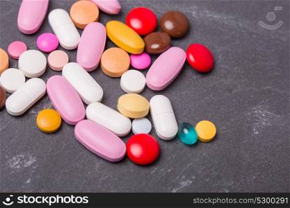 different tablets pills capsule heap mix therapy drugs