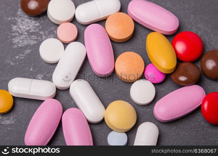 different tablets pills capsule heap mix therapy drugs