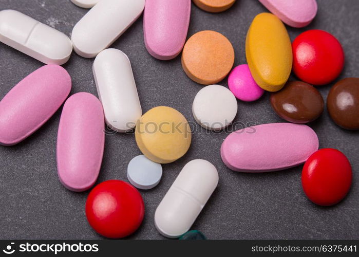 different tablets pills capsule heap mix therapy drugs