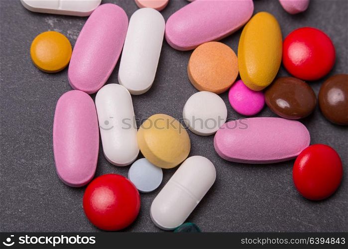 different tablets pills capsule heap mix therapy drugs