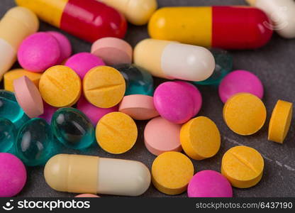 different tablets pills capsule heap mix therapy drugs