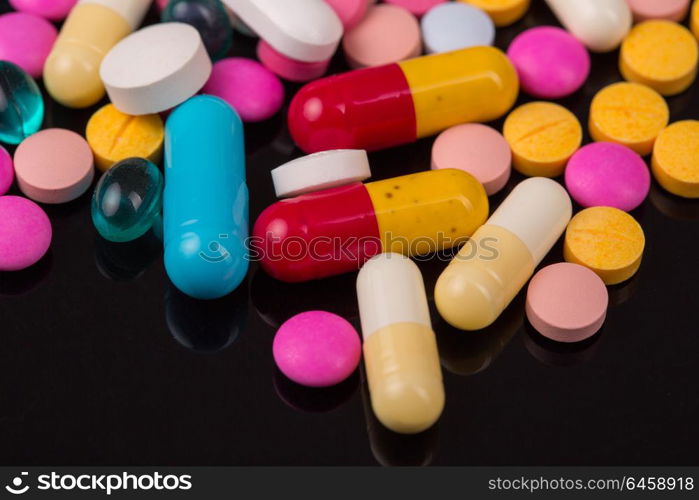 different tablets pills capsule heap mix therapy drugs