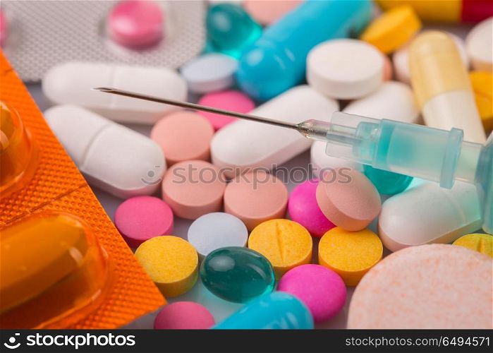 different tablets pills capsule heap mix therapy drugs. drugs