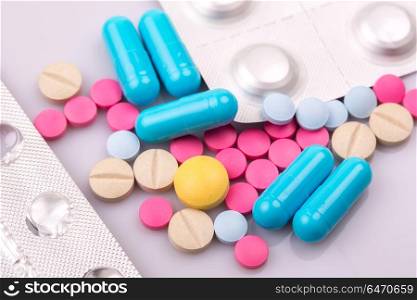 different Tablets pills capsule heap mix therapy drugs. Tablets pills