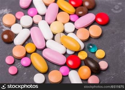 different tablets pills capsule heap mix therapy drugs. Tablets pills