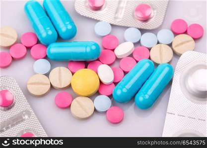 different Tablets pills capsule heap mix therapy drugs. Tablets pills