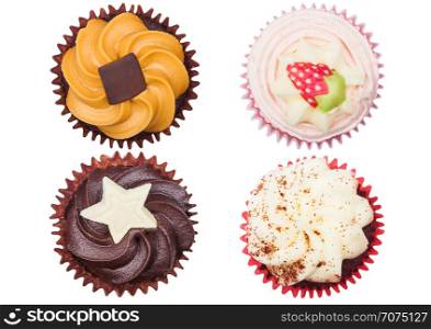 Different taste cupcakes muffins isolated on white background. Chocolate, toffee, strawberry and white cream.