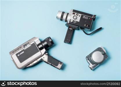 different type camcorder blue background