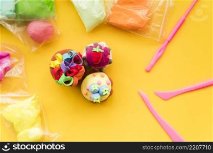 different type handmade colorful clay yellow backdrop