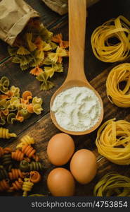 different types of colored pasta with various shapes