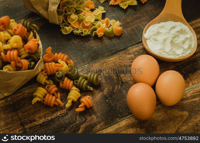 different types of colored pasta with various shapes