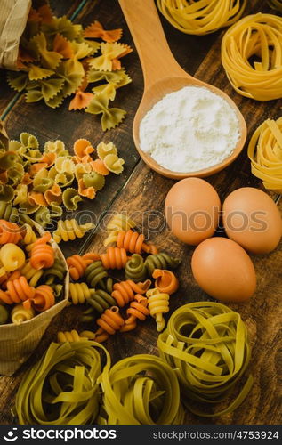 different types of colored pasta with various shapes