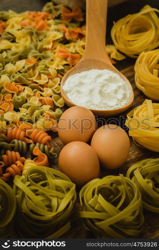 different types of colored pasta with various shapes