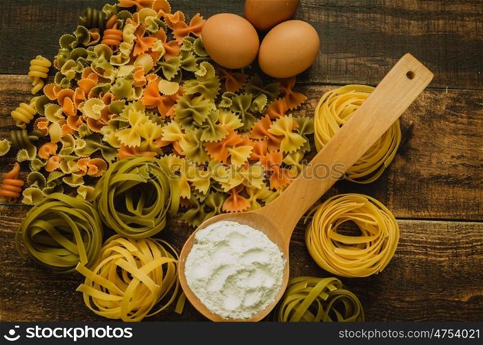 different types of colored pasta with various shapes