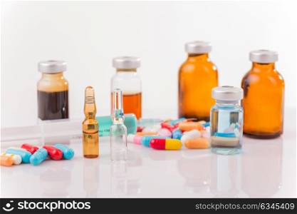 Different types of drugs on white background