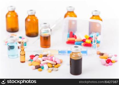 Different types of drugs on white background