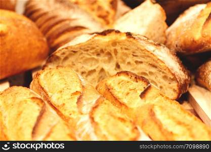 Different types of fresh baked bread. Selective focus.