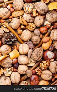 Different types of nuts.Natural background made from different kinds of nuts.. Background of mixed nuts
